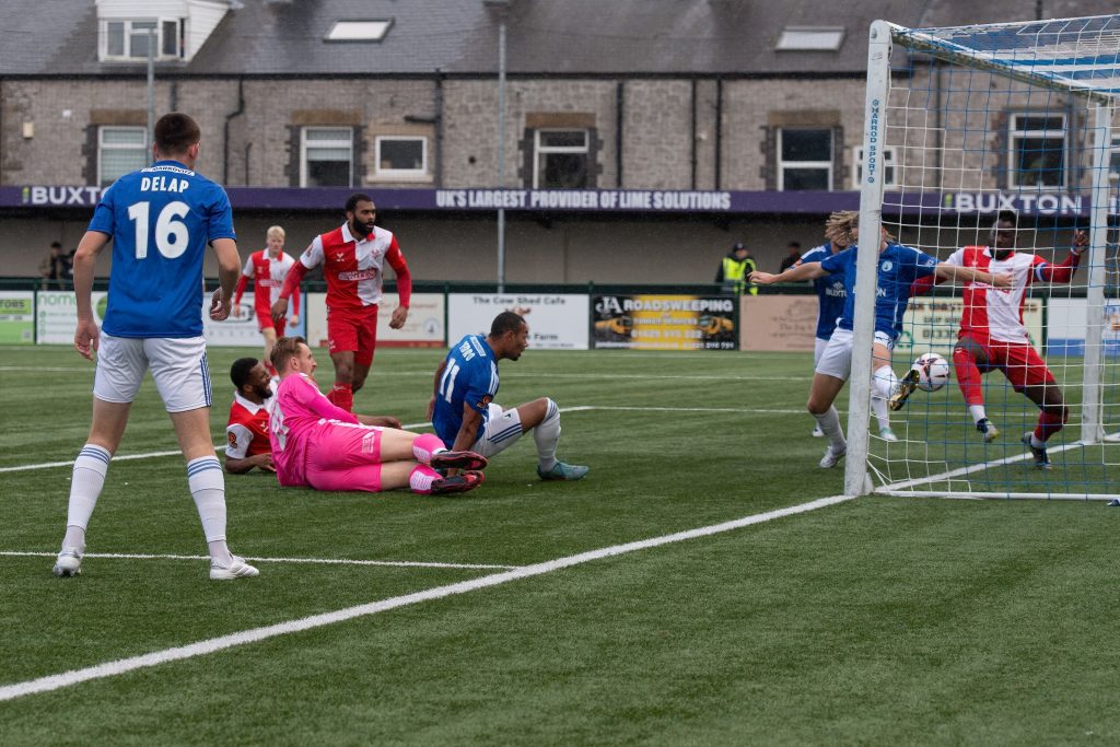 Buxton's Kieran Burton scores in their FA Cup third qualifying round game against Kidderminstter Harriers