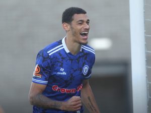 Kairo Mitchell's rapid hat-trick set Rochdale en route to the FA Cup first round
