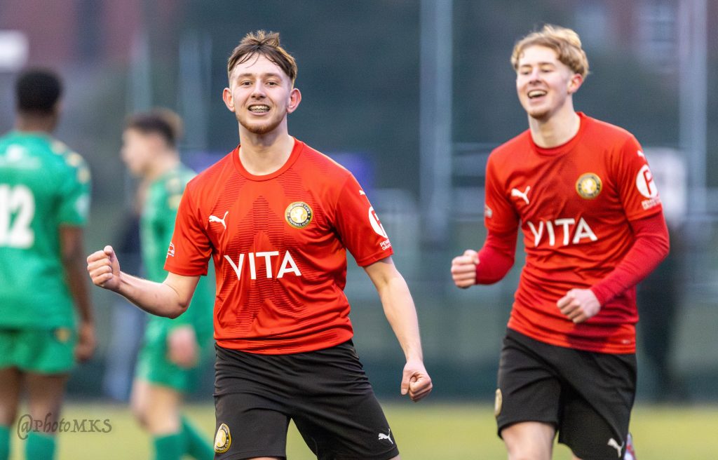 Stockport Town players celebrate during their 3-0 win over Pilkington
